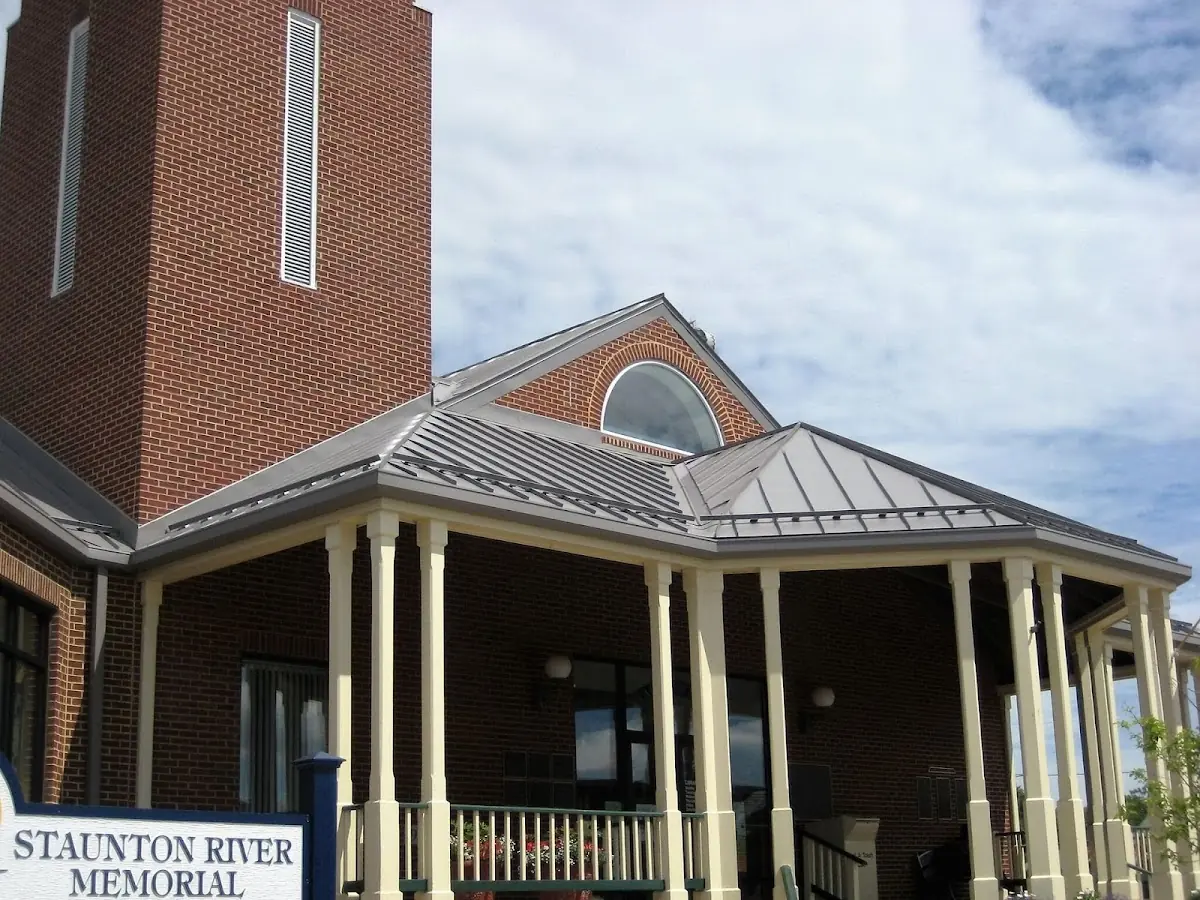 Skilled roofing craftsmen working on a residential roof in Seaville